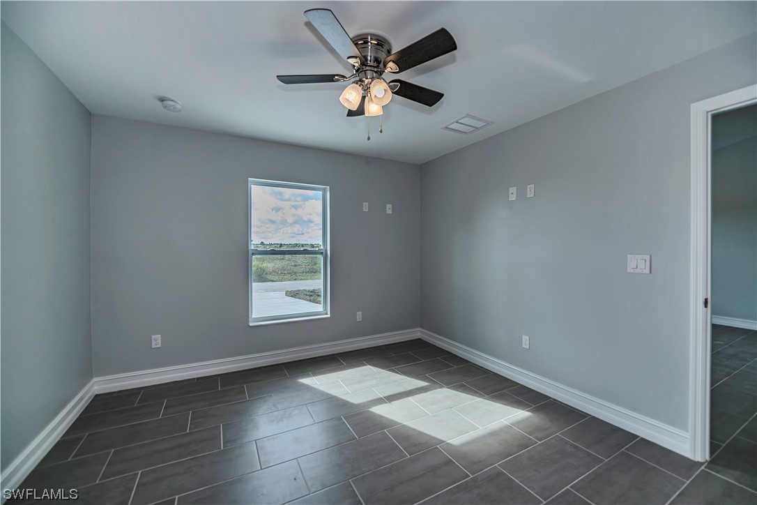 9024 Largo Circle LaBelle, FL 33935 - Photo 17 of 27 a view of an empty room with a window