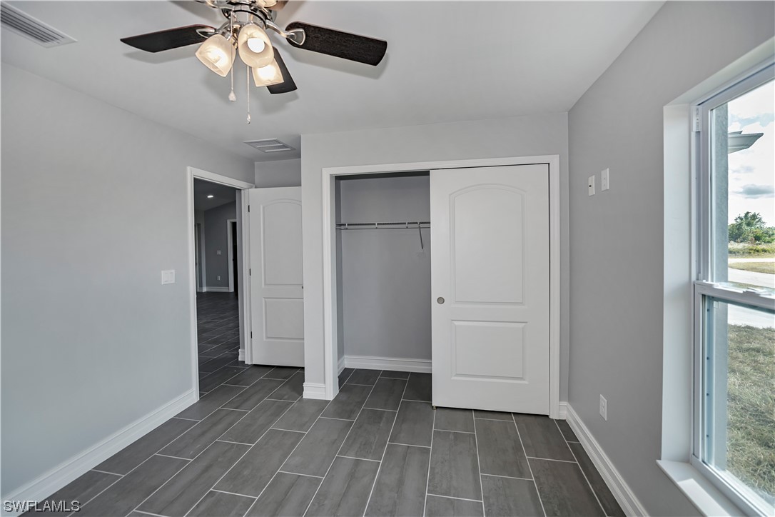 9024 Largo Circle LaBelle, FL 33935 - Photo 23 of 27 a view of an empty room with a window