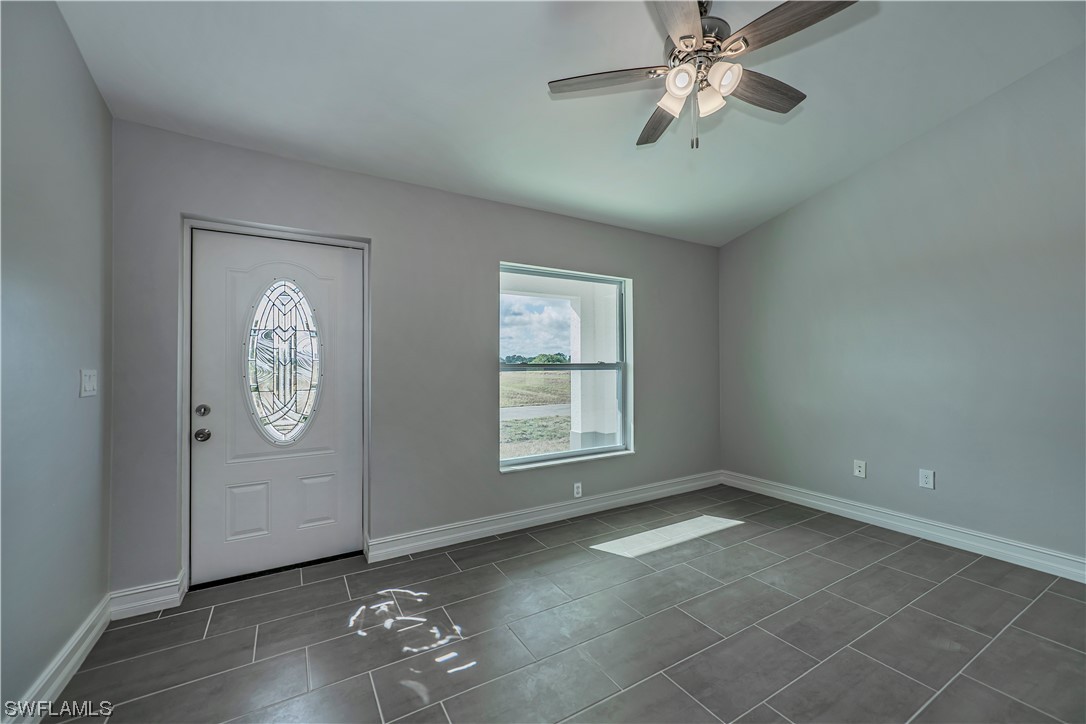 9024 Largo Circle LaBelle, FL 33935 - Photo 8 of 27 a view of an empty room with a window