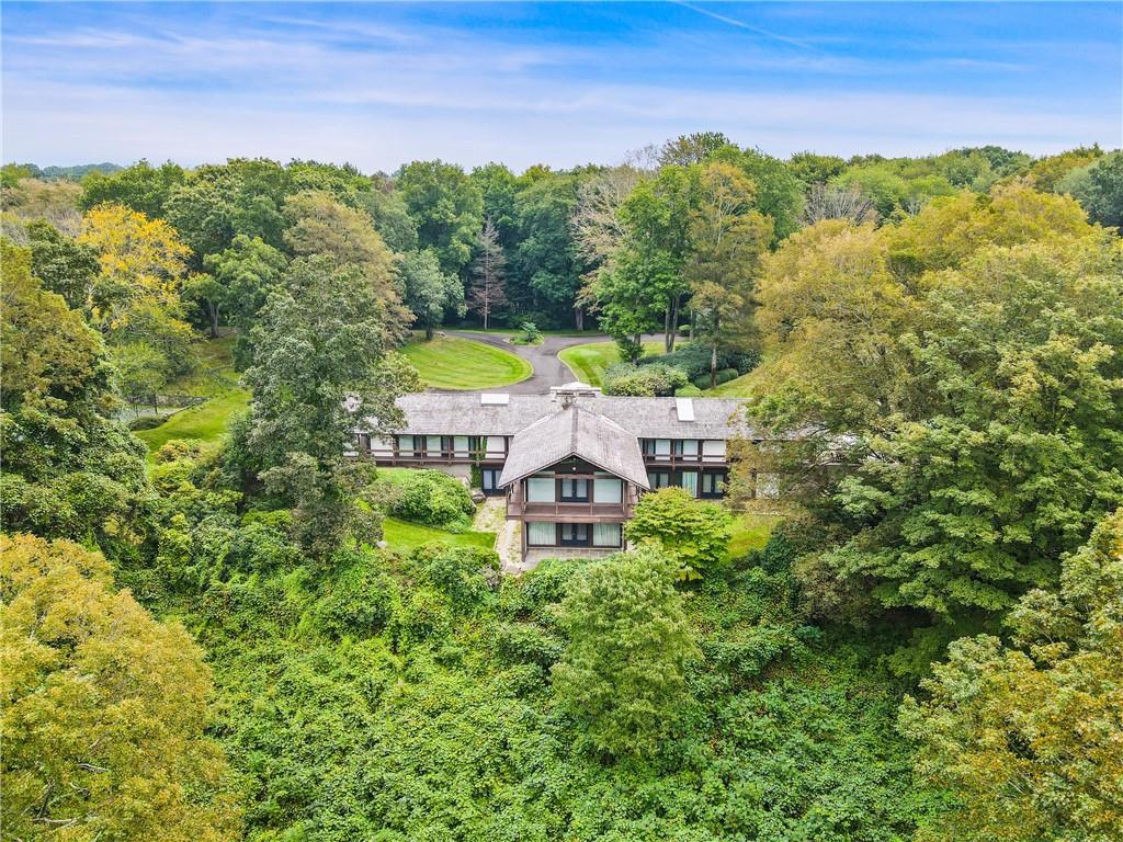 36 Lyndel Road Pound Ridge, NY 10576 - Photo 1 of 1 a swimming pool with trees in the background