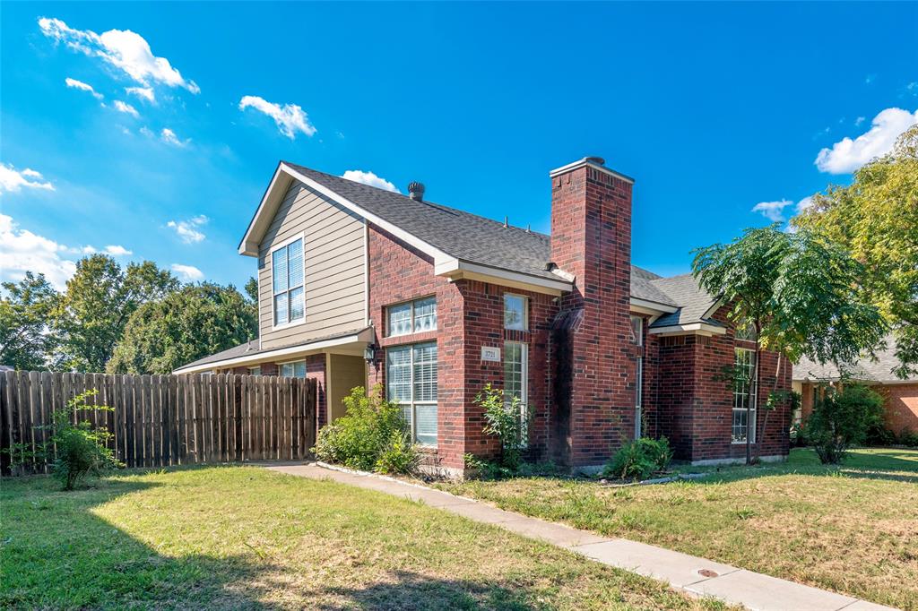 3721 Smartt Street Rowlett, TX 75088 - Photo 2 of 25 View of side of home featuring brick siding, a chimney, and a shingled roof