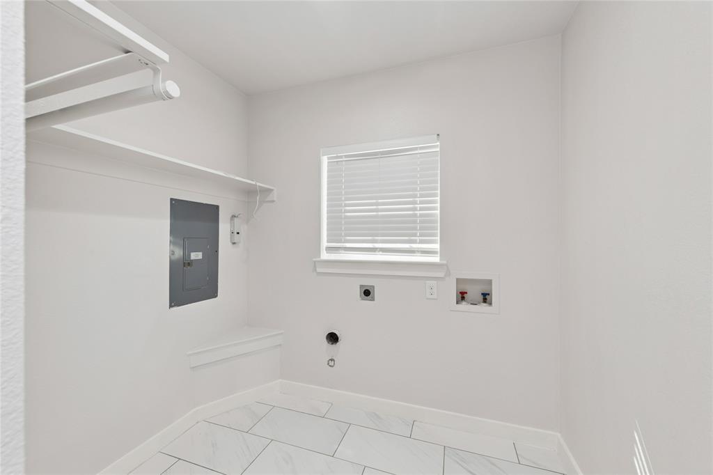3721 Smartt Street Rowlett, TX 75088 - Photo 22 of 25 Washroom with hookup for a washing machine, electric panel, and hookup for an electric dryer