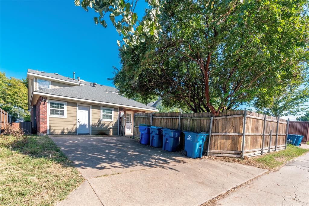 3721 Smartt Street Rowlett, TX 75088 - Photo 25 of 25 View of front of home featuring a shingled roof