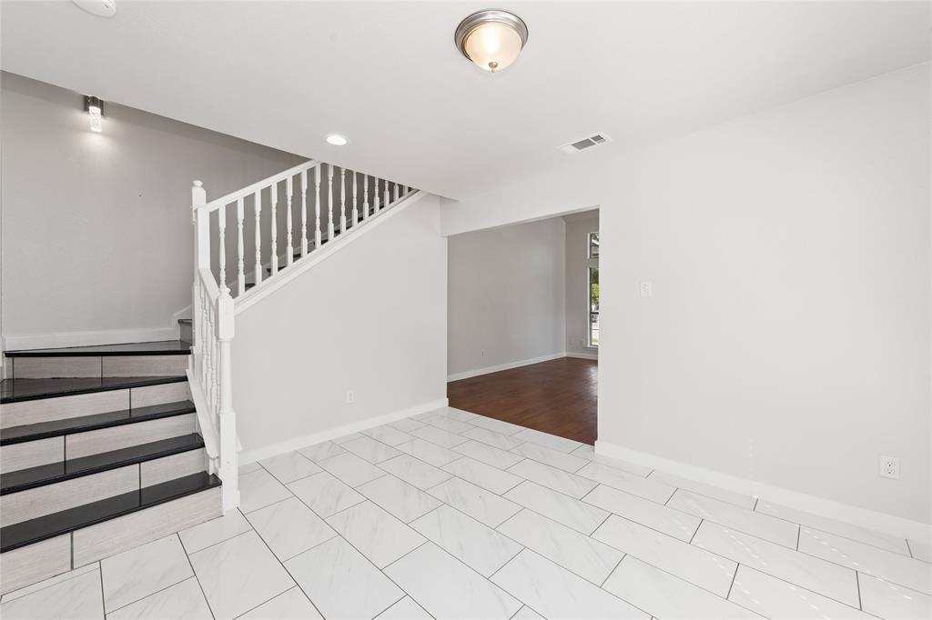 3721 Smartt Street Rowlett, TX 75088 - Photo 6 of 25 Stairway with recessed lighting and tile patterned flooring