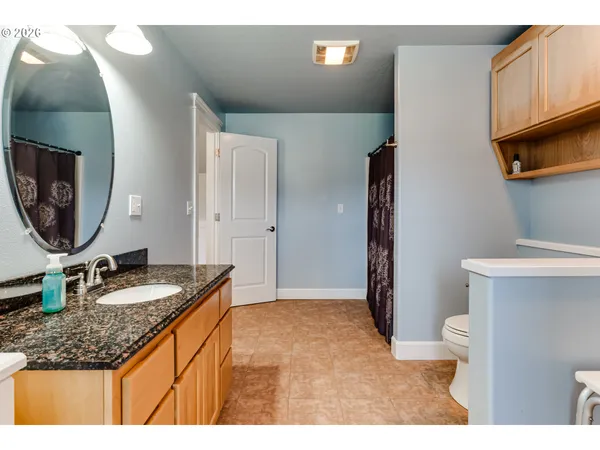 a kitchen with a sink stove and refrigerator