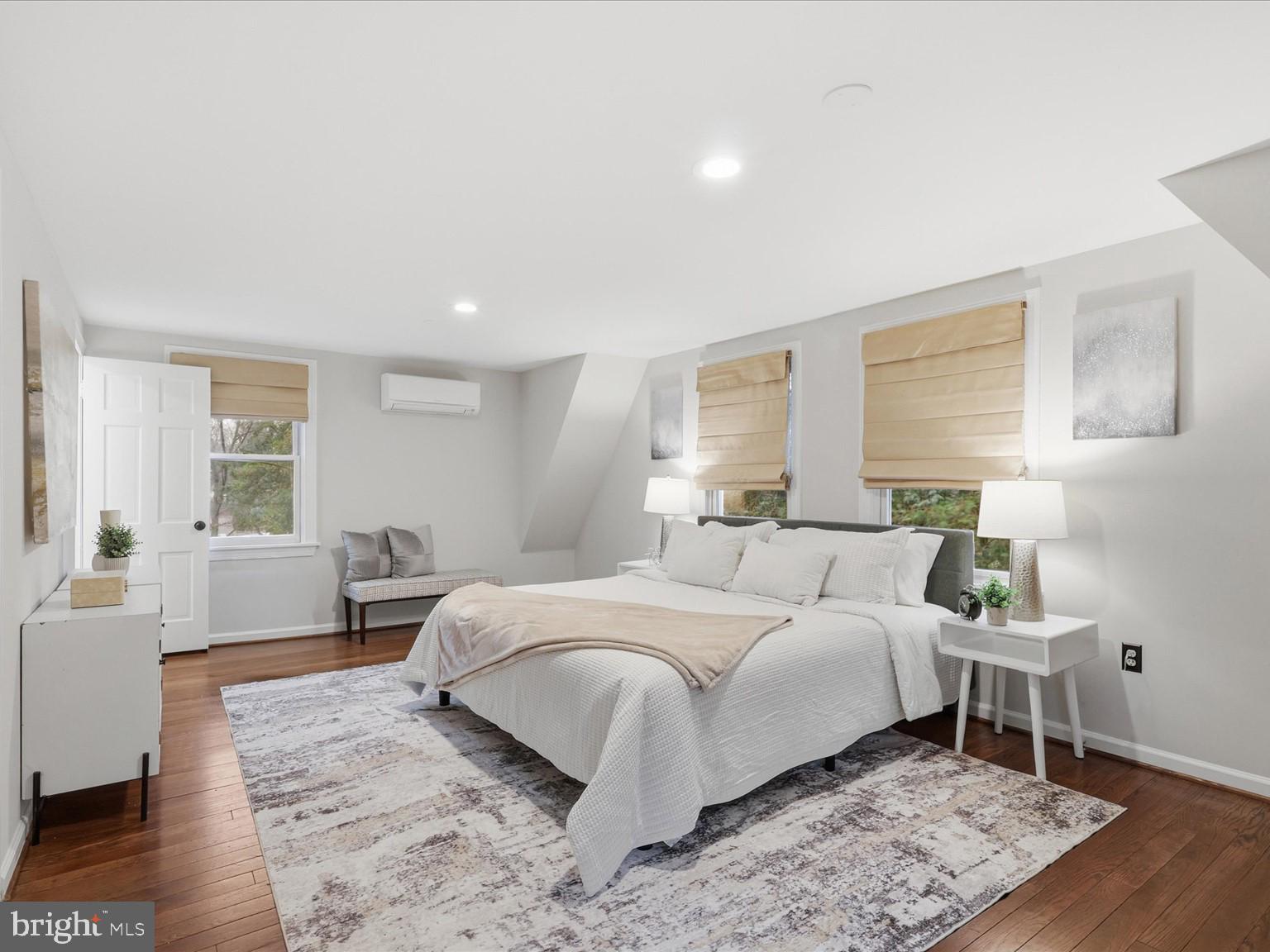 6437 Spring Terrace Falls Church, VA 22042 - Photo 18 of 42 a bedroom with a bed and a wooden floor