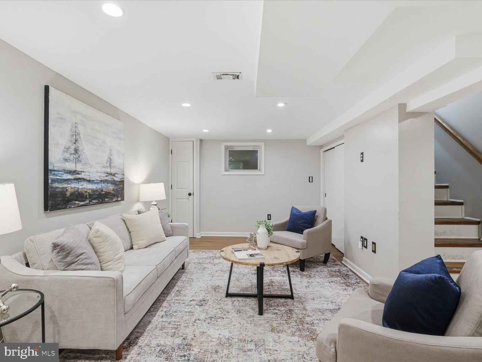 6437 Spring Terrace Falls Church, VA 22042 - Photo 24 of 42 a living room with furniture or couch and a rug