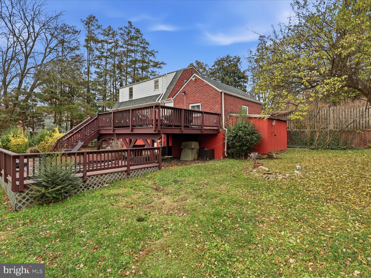 6437 Spring Terrace Falls Church, VA 22042 - Photo 33 of 42 a front view of a house with garden