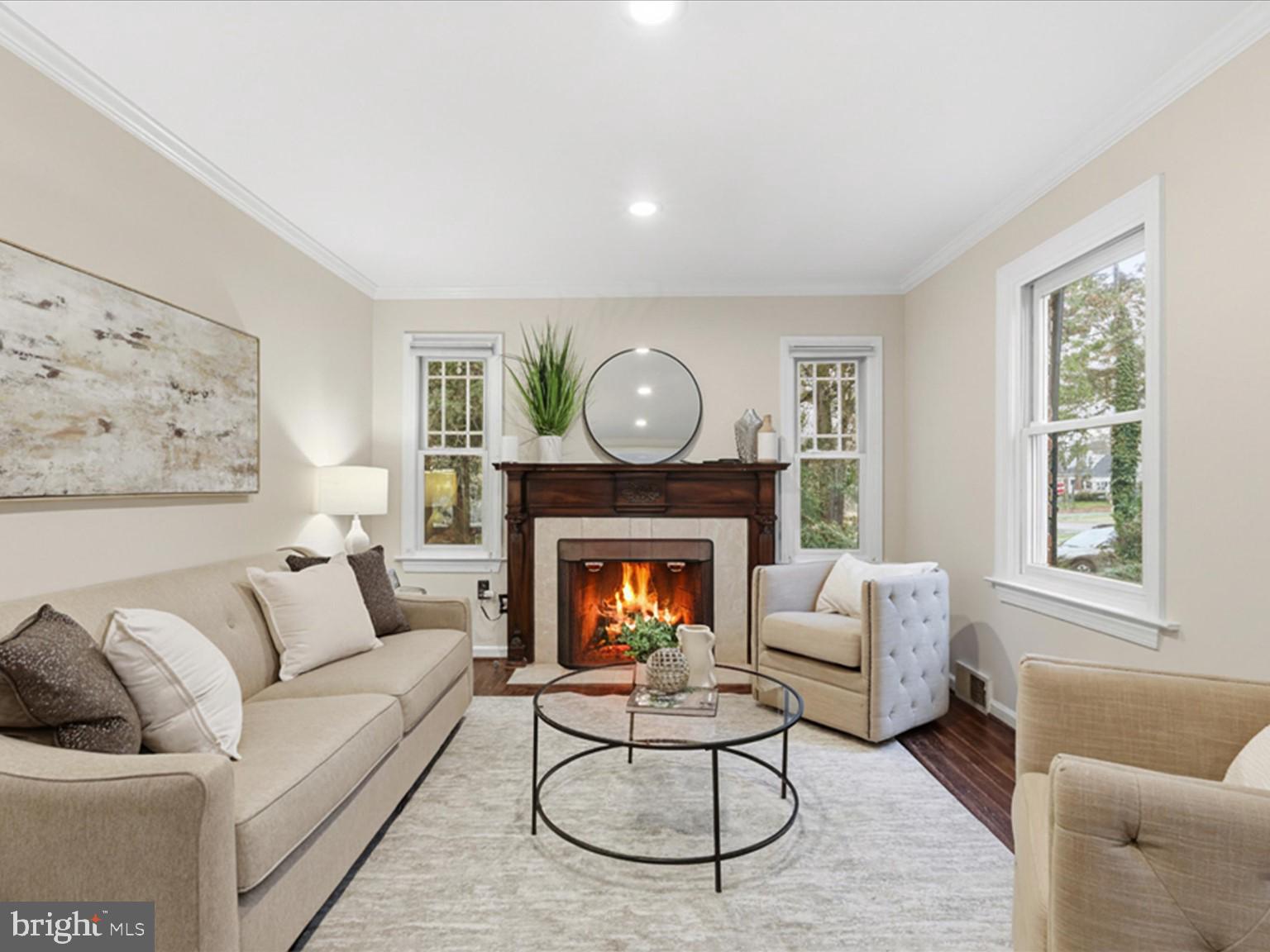6437 Spring Terrace Falls Church, VA 22042 - Photo 5 of 42 a living room with furniture and a fireplace