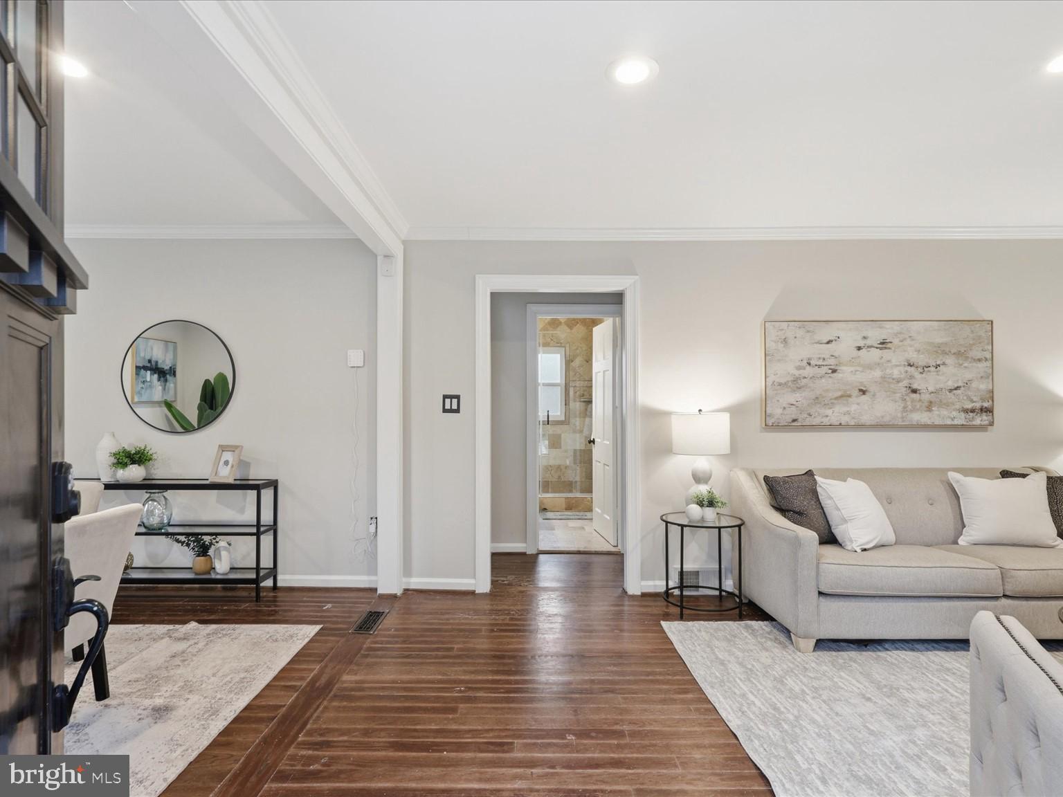 6437 Spring Terrace Falls Church, VA 22042 - Photo 6 of 42 a living room with furniture and a wooden floor