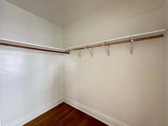 a view of a room with racks on the wall
