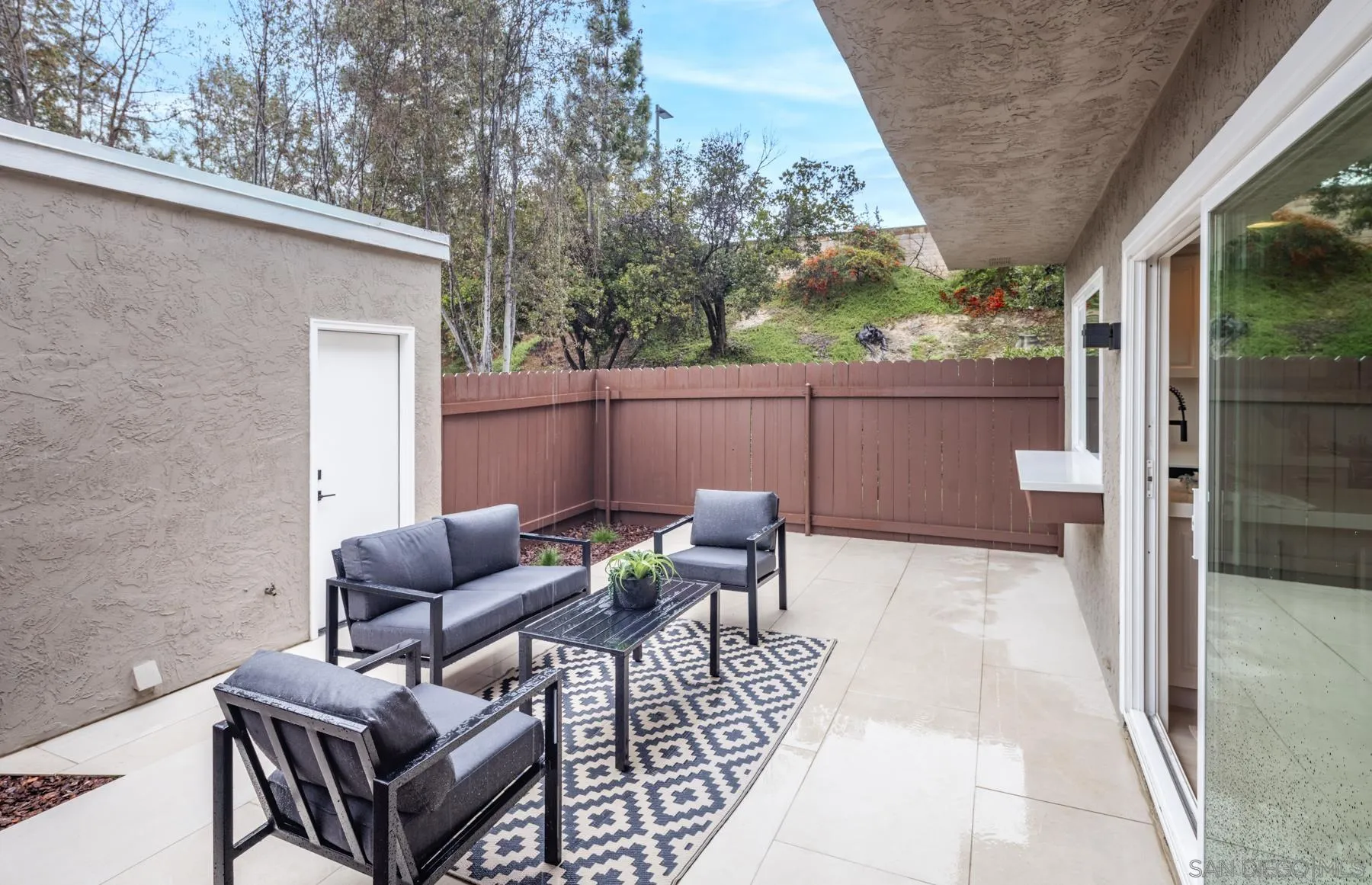 1999 Azure Way Encinitas, CA 92024 - Photo 11 of 27 a view of backyard with outdoor seating