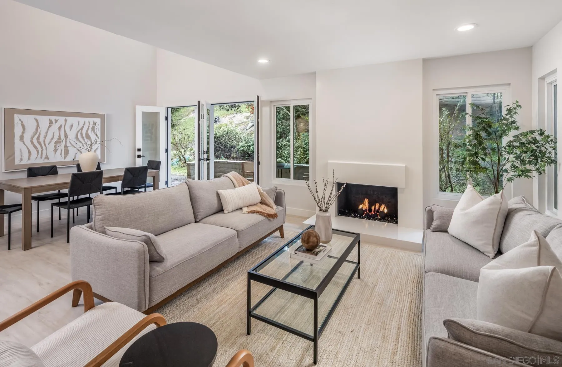 1999 Azure Way Encinitas, CA 92024 - Photo 18 of 27 a living room with furniture and a fireplace