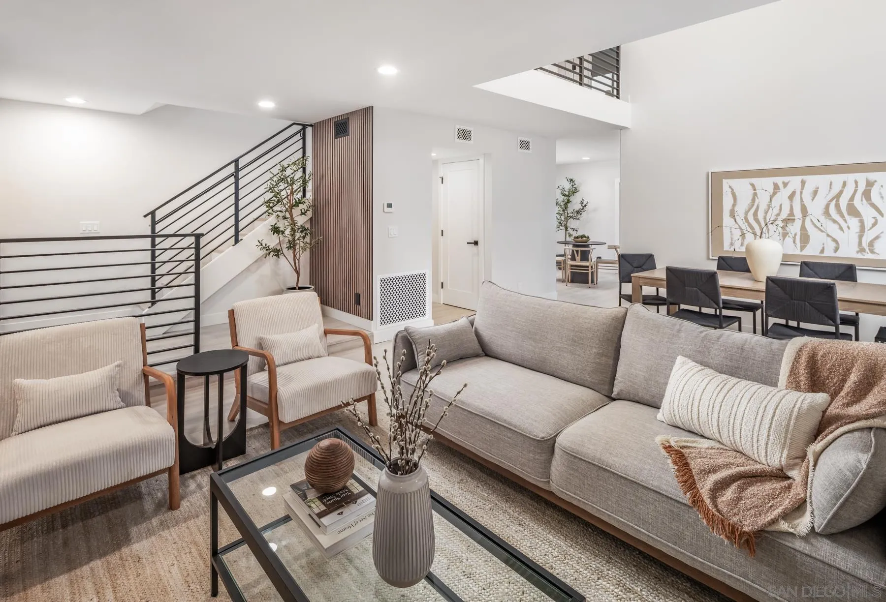1999 Azure Way Encinitas, CA 92024 - Photo 19 of 27 a living room with furniture or couch and a window