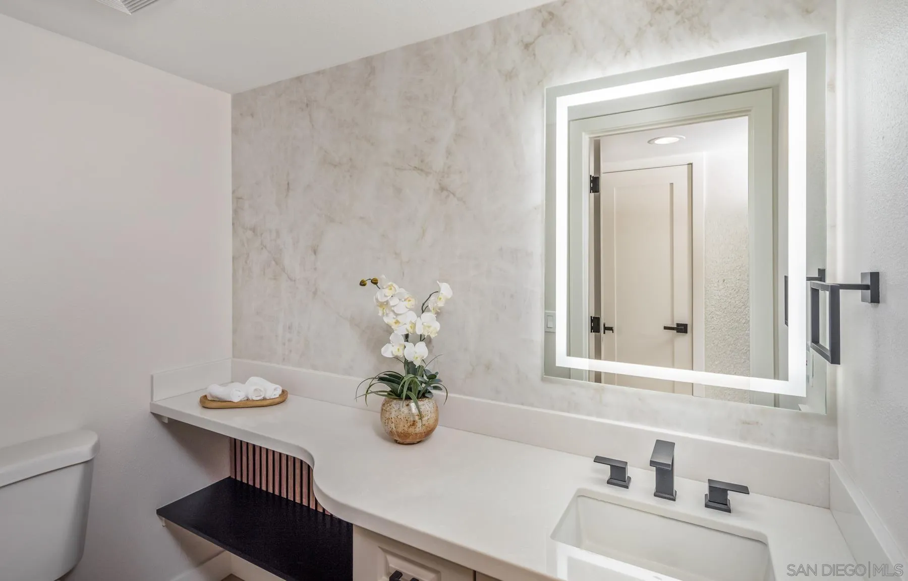 1999 Azure Way Encinitas, CA 92024 - Photo 21 of 27 a bathroom with a sink and a mirror