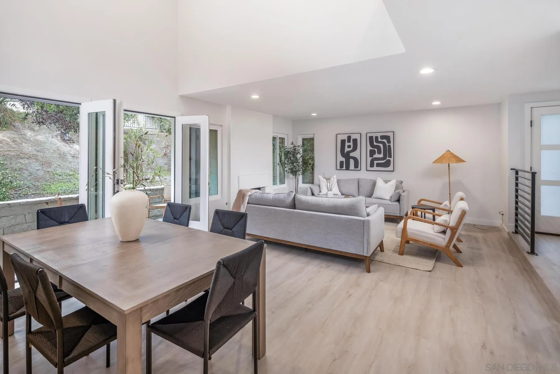 1999 Azure Way Encinitas, CA 92024 - Photo 23 of 27 a view of a dining room with furniture and wooden floor