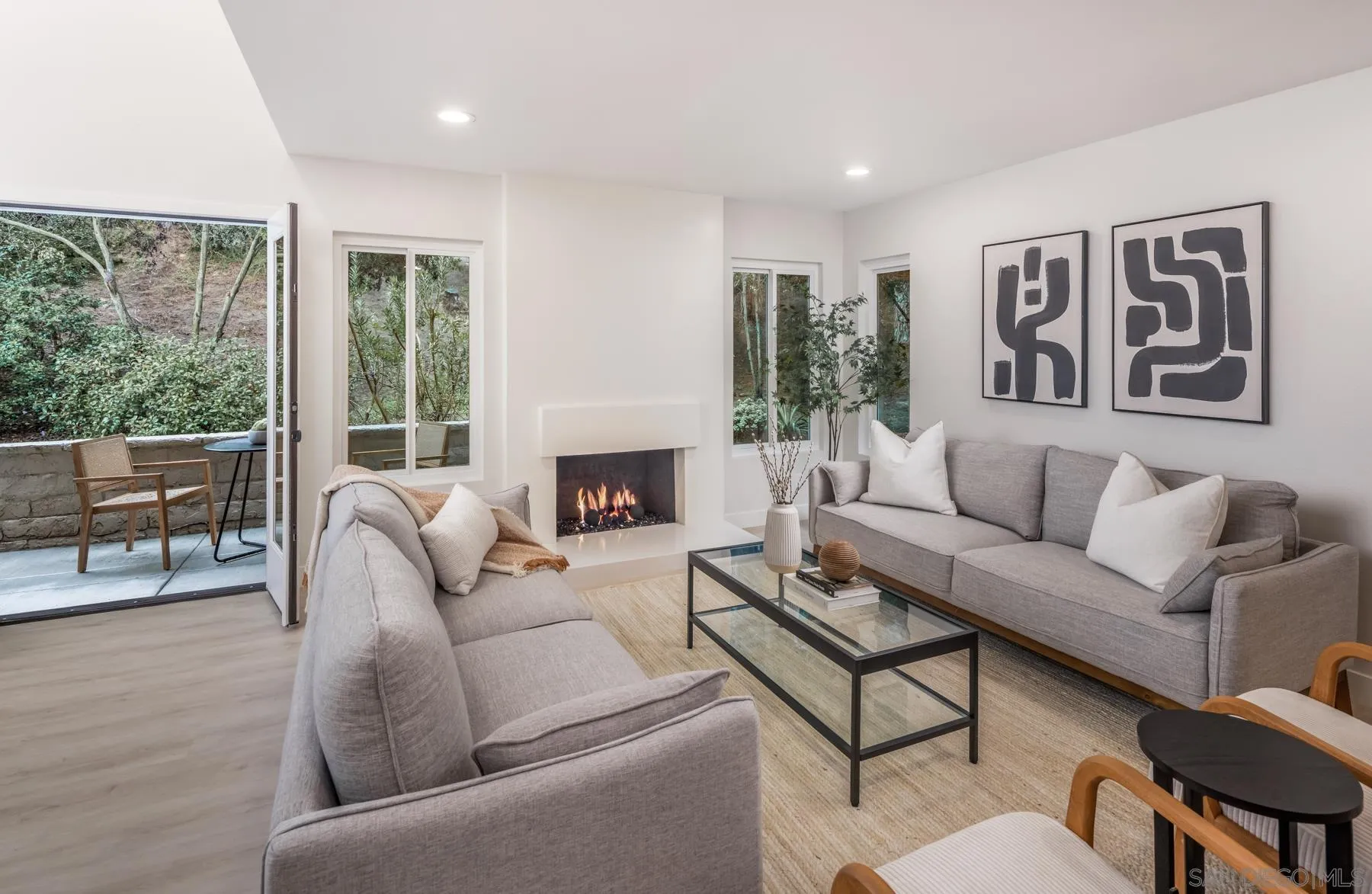 1999 Azure Way Encinitas, CA 92024 - Photo 25 of 27 a living room with furniture and a large window