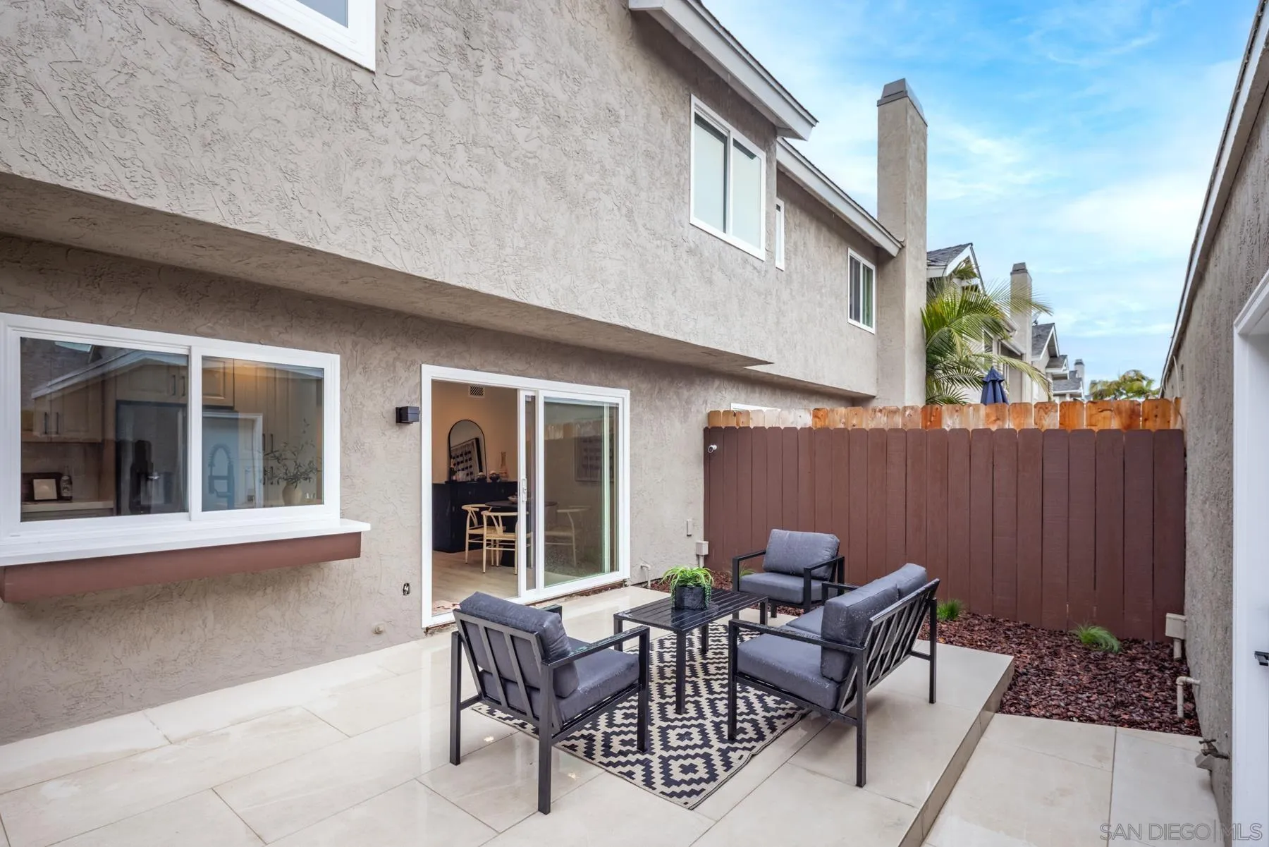 1999 Azure Way Encinitas, CA 92024 - Photo 6 of 27 a backyard of a house with outdoor seating