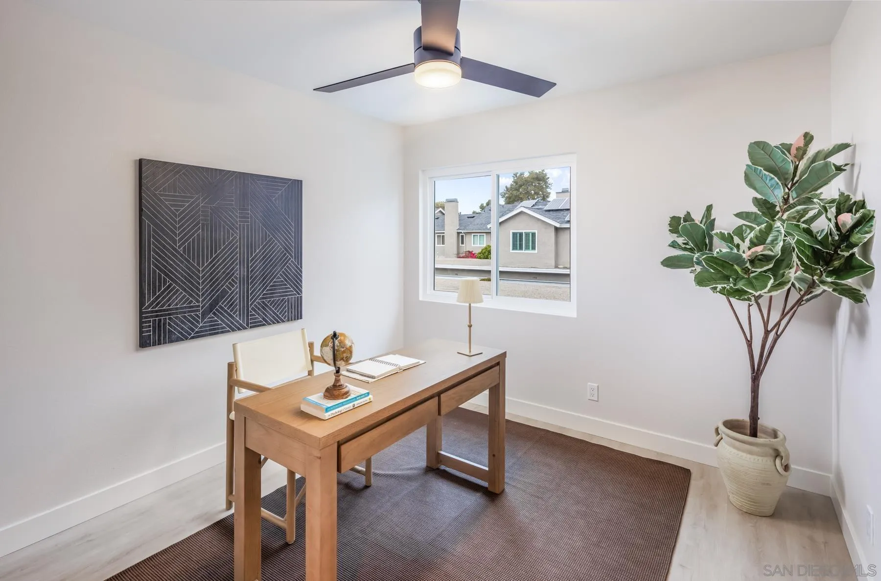 1999 Azure Way Encinitas, CA 92024 - Photo 7 of 27 a living room with furniture and a potted plant
