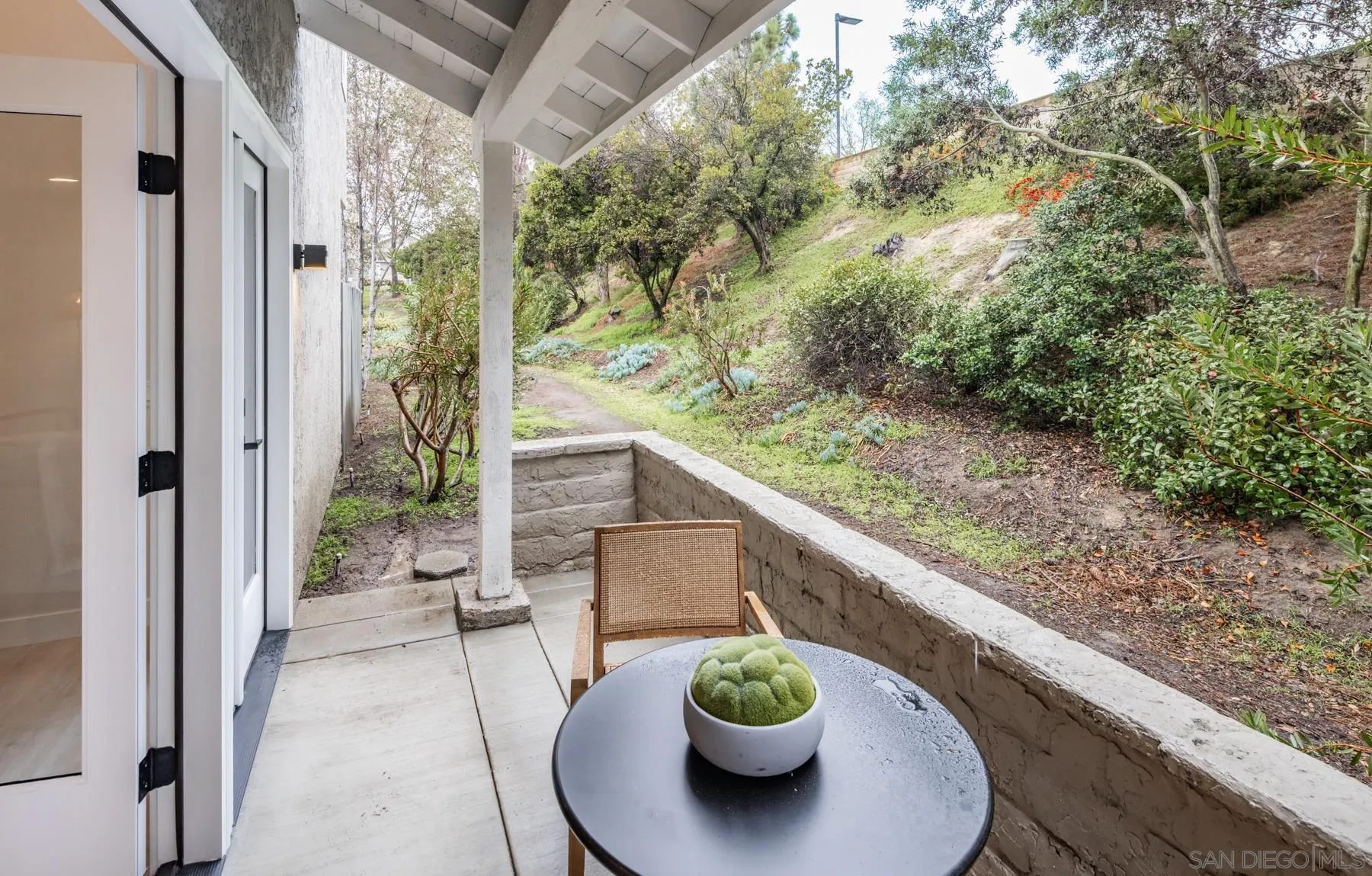 1999 Azure Way Encinitas, CA 92024 - Photo 10 of 27 a view of a balcony with chair and potted plant