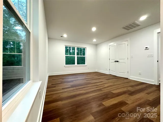 a view of an empty walk in closet