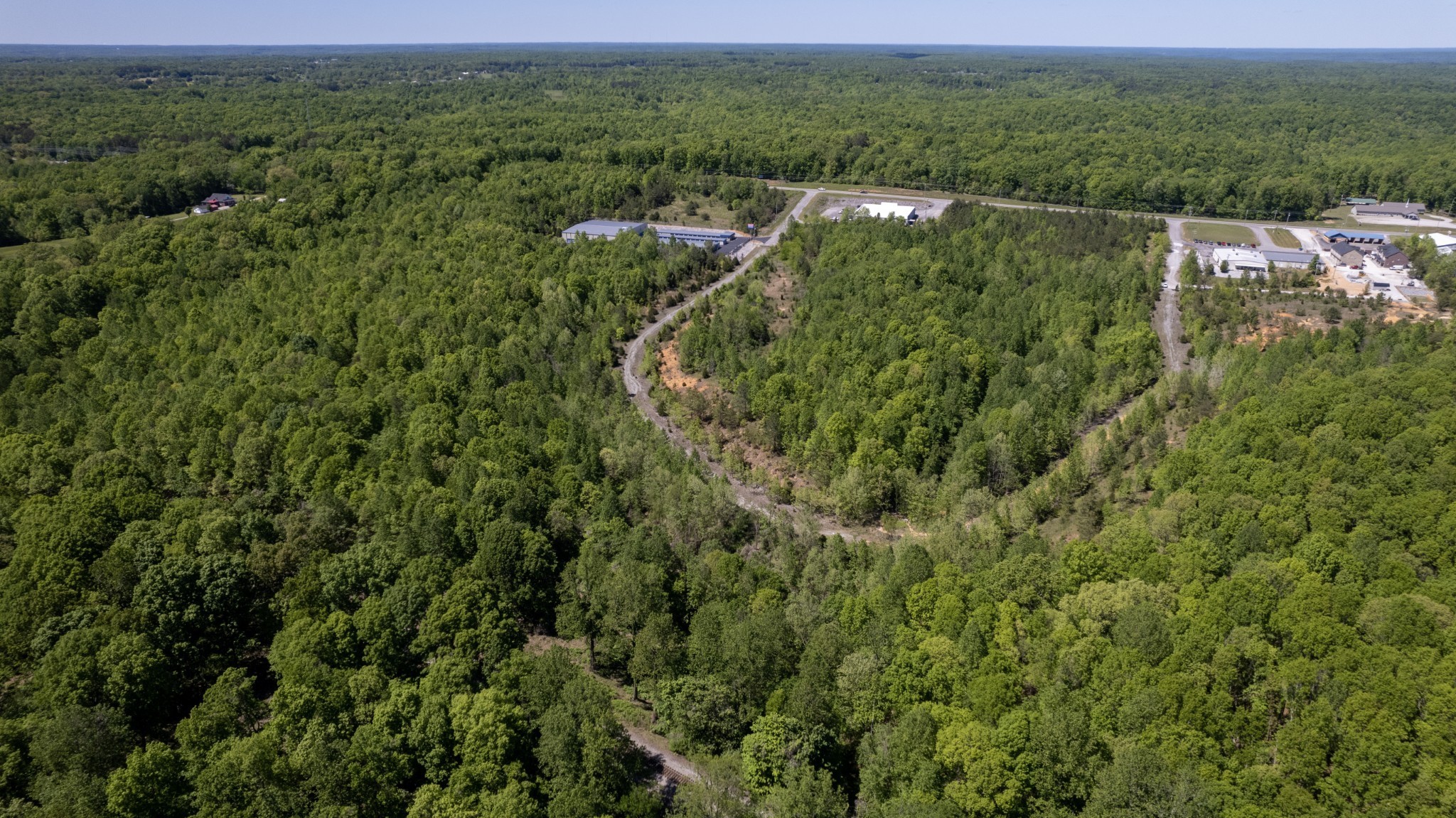 0 East Highway 70 White Bluff, TN 37187 - Photo 20 of 26 an aerial view of residential houses with outdoor space and trees