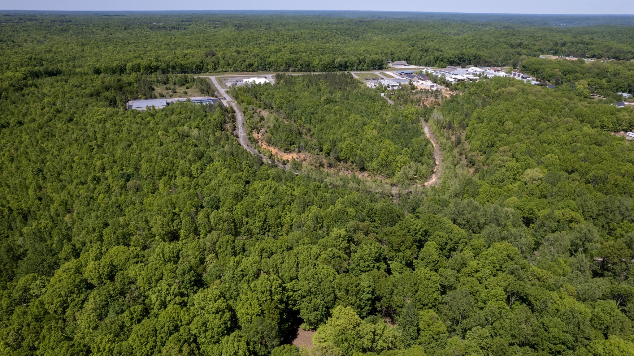 0 East Highway 70 White Bluff, TN 37187 - Photo 22 of 26 an aerial view of residential houses with outdoor space and trees