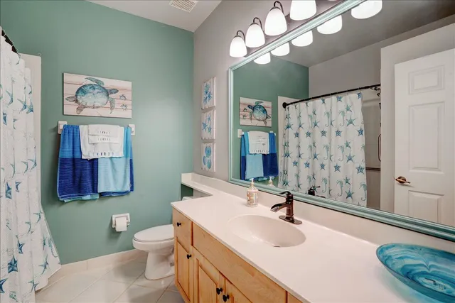 an aerial view of a city with a lake view