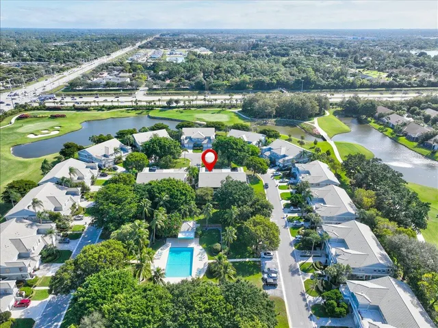 a view of a chairs and table on the patio