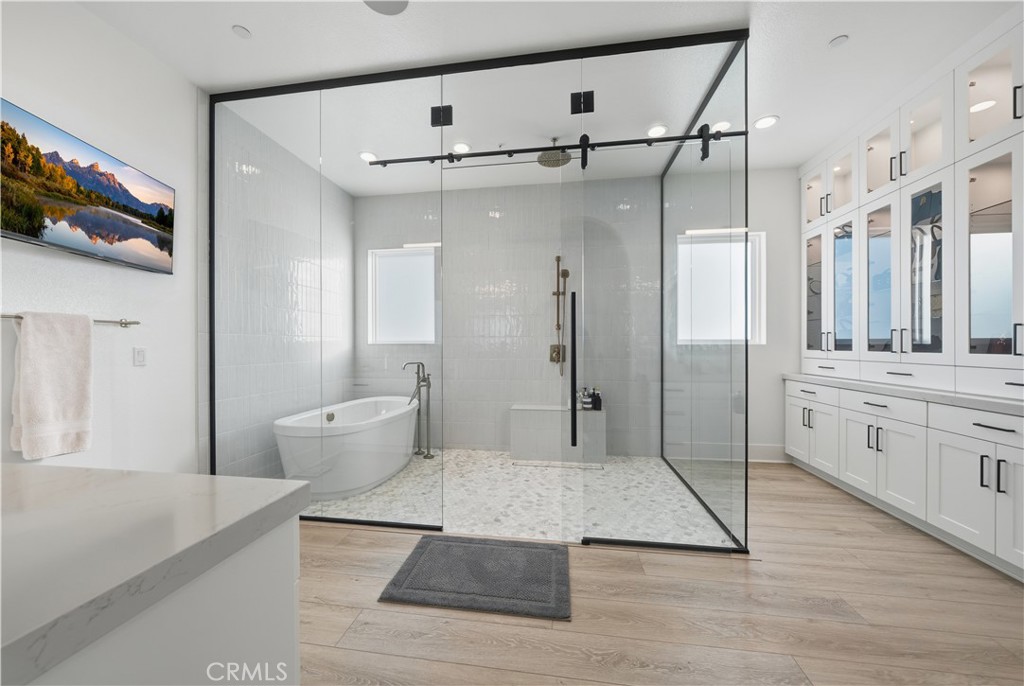 39788 Larkspur Terrace Temecula, CA 92591 - Photo 33 of 75 a bathroom with a sink a toilet and shower