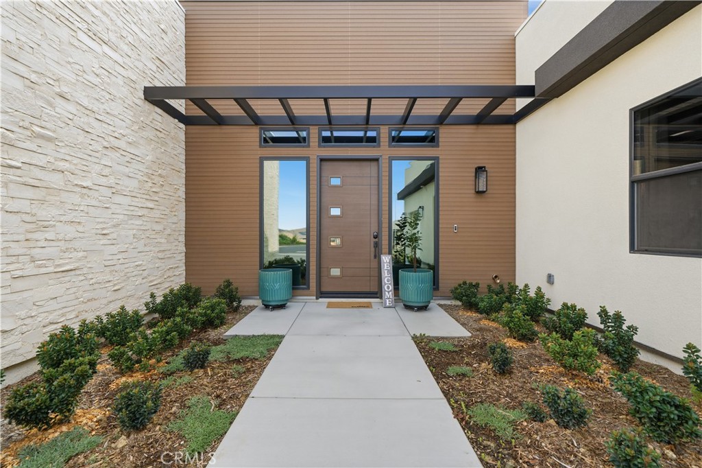 39788 Larkspur Terrace Temecula, CA 92591 - Photo 8 of 75 a porch with seating space and yard