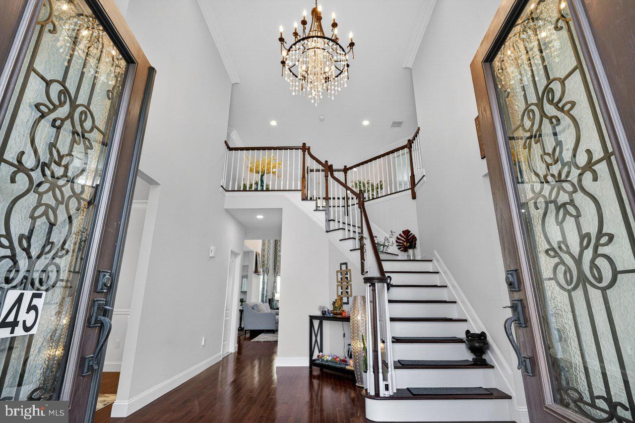 45 Emerald Road Robbinsville, NJ 08691 - Photo 9 of 57 Elegant entryway with grand staircase.