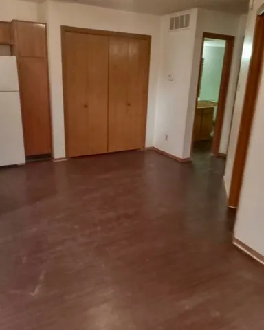 an empty room with closet