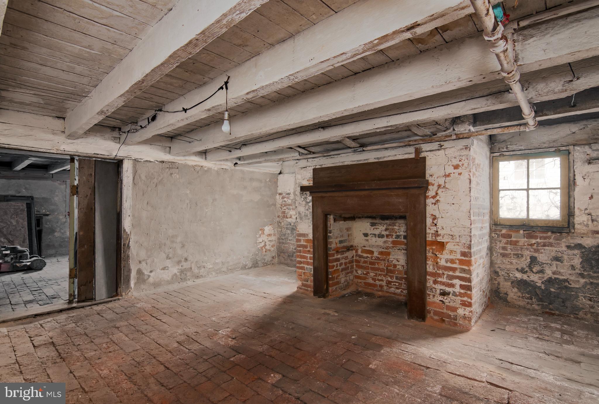 209-211 High Street Cambridge, MD 21613 - Photo 42 of 52 Original Basement Fireplace