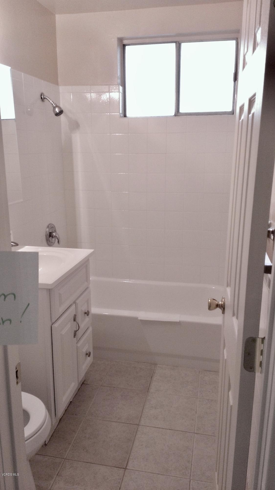 246 Valley Road Oak View, CA 93022 - Photo 13 of 34 a bathroom with a sink a toilet and shower