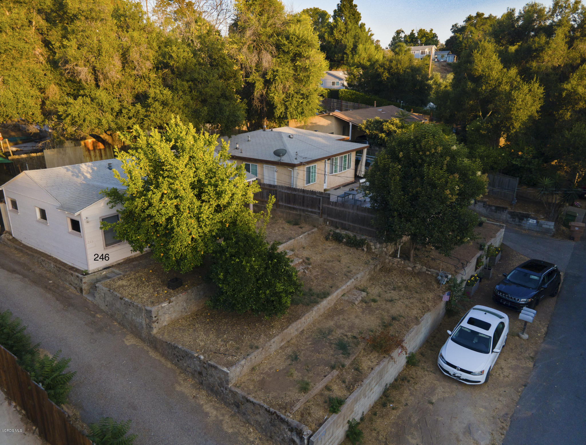 246 Valley Road Oak View, CA 93022 - Photo 16 of 34 an aerial view of a house with a yard