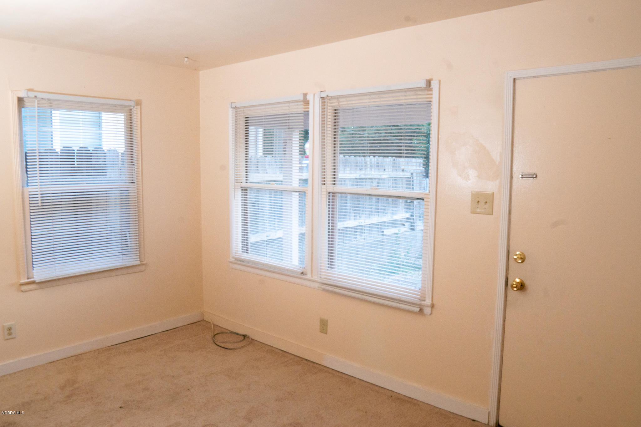 246 Valley Road Oak View, CA 93022 - Photo 19 of 34 an empty room with windows and closet
