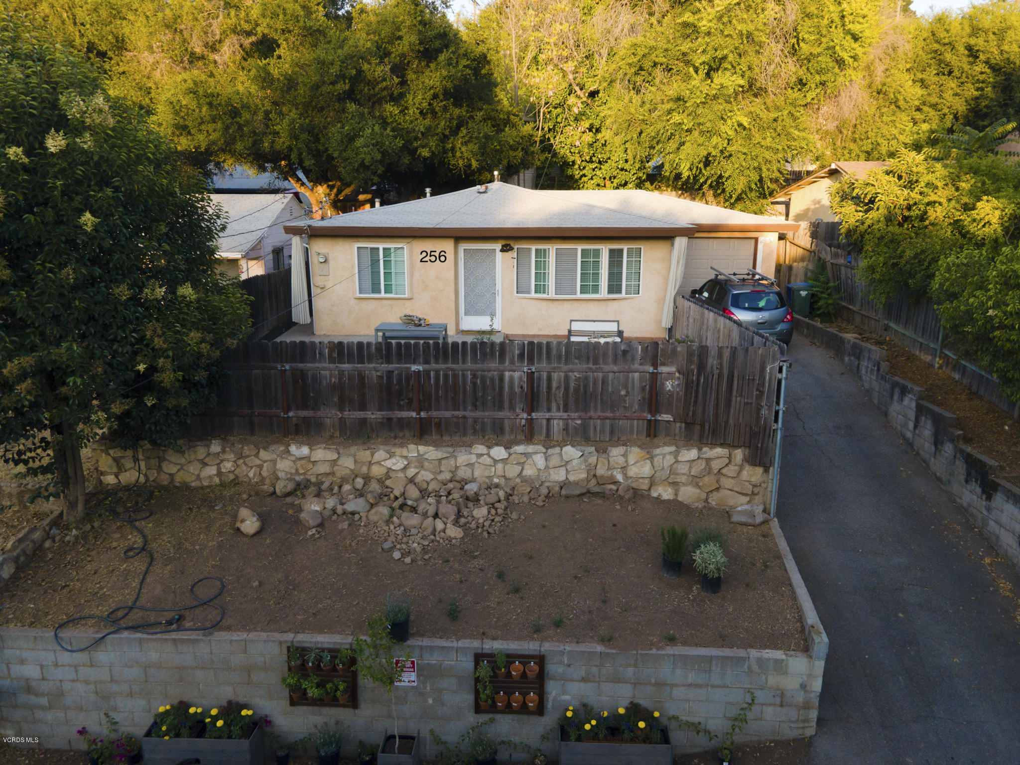 246 Valley Road Oak View, CA 93022 - Photo 6 of 34 a front view of a house with garden