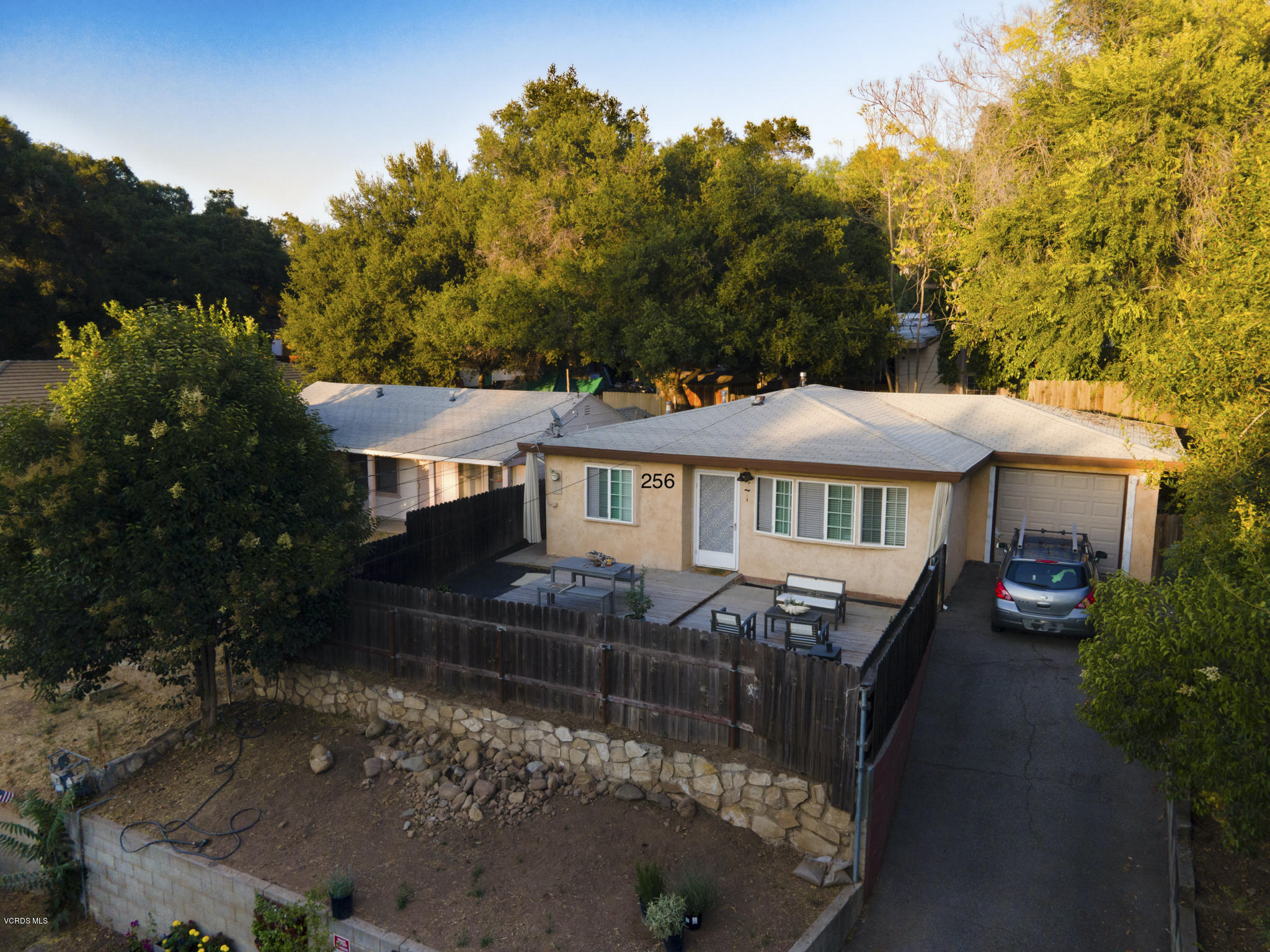 246 Valley Road Oak View, CA 93022 - Photo 8 of 34 a view of a house with a garden