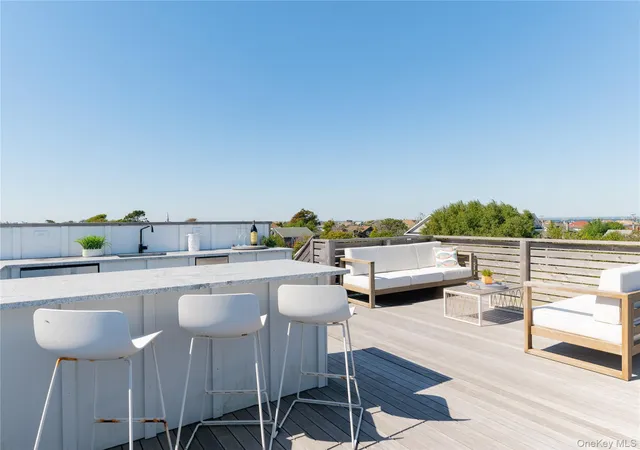a kitchen with a table and chairs