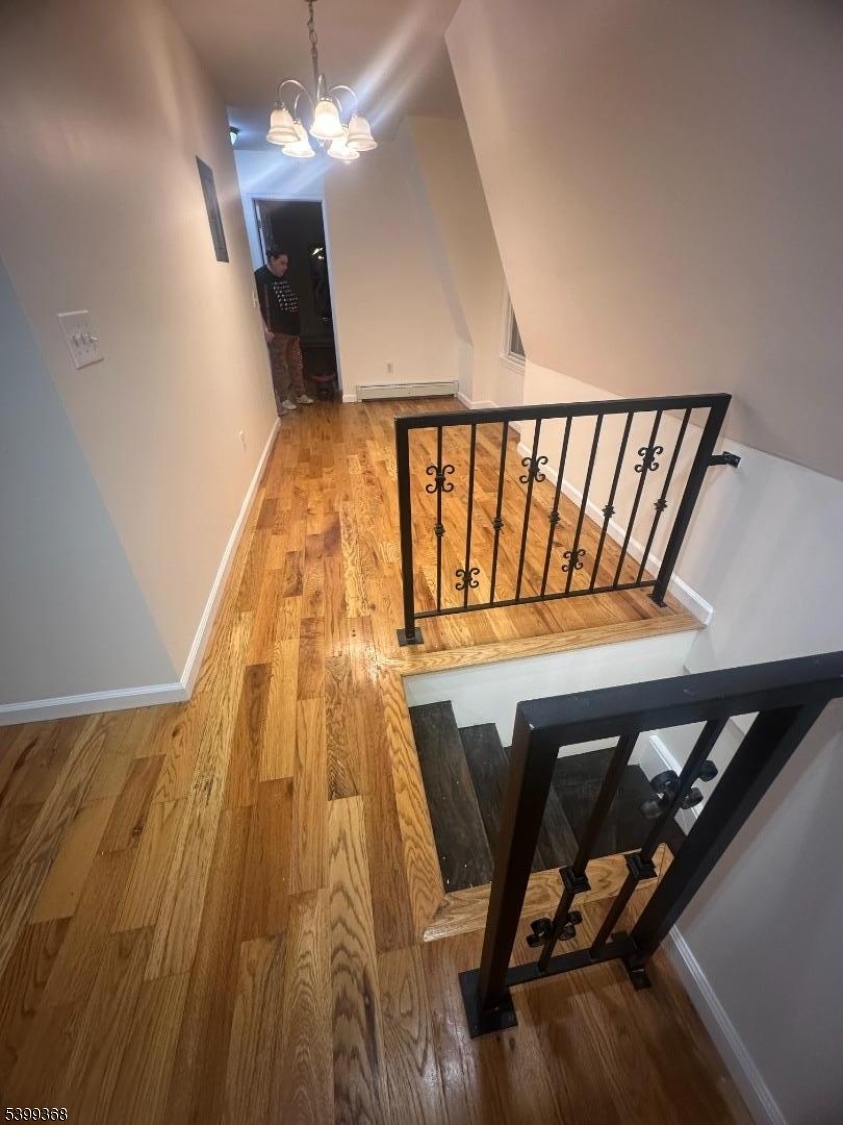 192 Fairview Avenue, Unit 3 Jersey City, NJ 07304 - Photo 2 of 9 a view of entryway with wooden floor