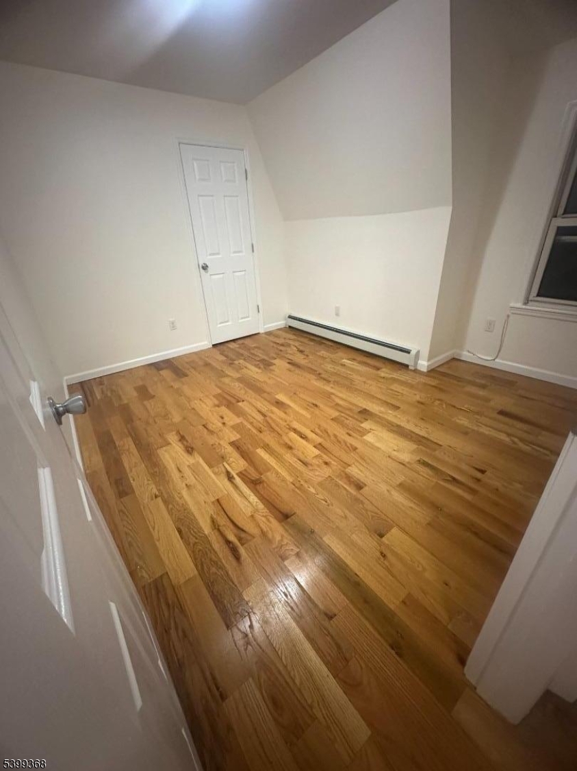192 Fairview Avenue, Unit 3 Jersey City, NJ 07304 - Photo 4 of 9 a view of wooden floor