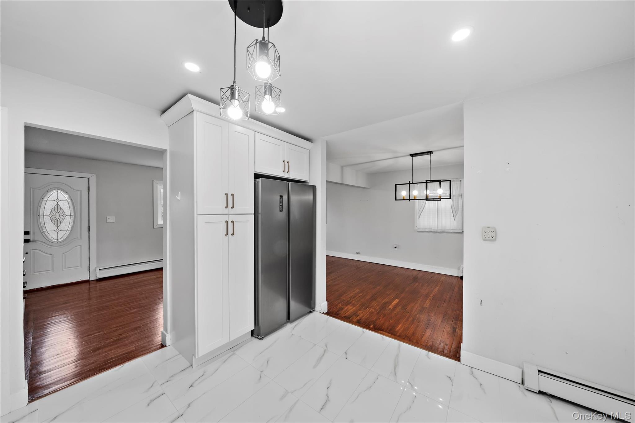 57 School Road Monroe, NY 10950 - Photo 11 of 33 a kitchen with stainless steel appliances a refrigerator and a microwave