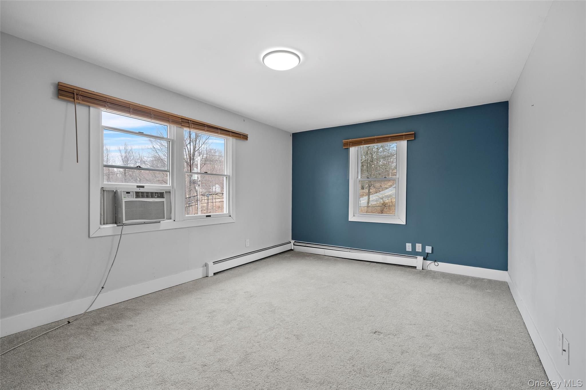 57 School Road Monroe, NY 10950 - Photo 21 of 33 an empty room with windows