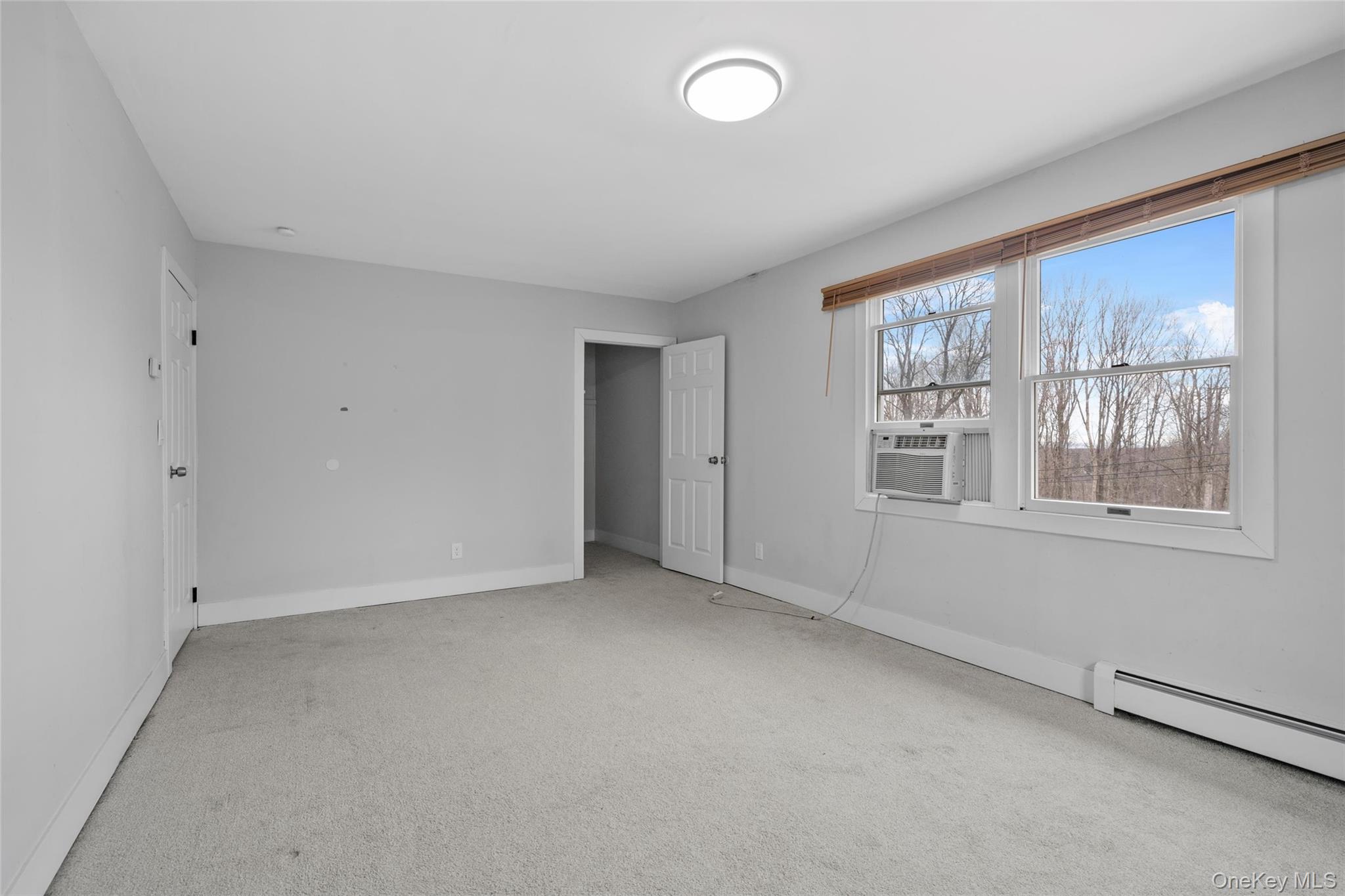 57 School Road Monroe, NY 10950 - Photo 23 of 33 an empty room with windows
