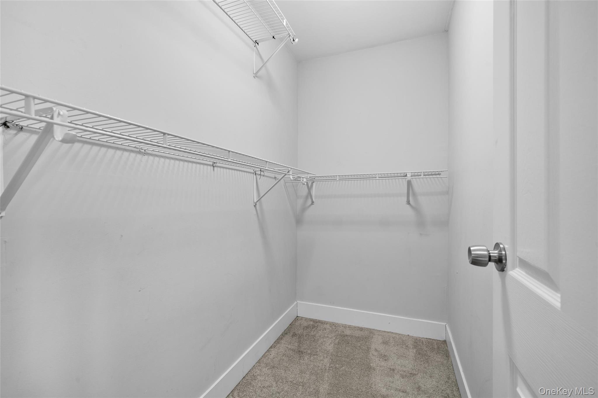 57 School Road Monroe, NY 10950 - Photo 24 of 33 a view of a room with racks on the wall