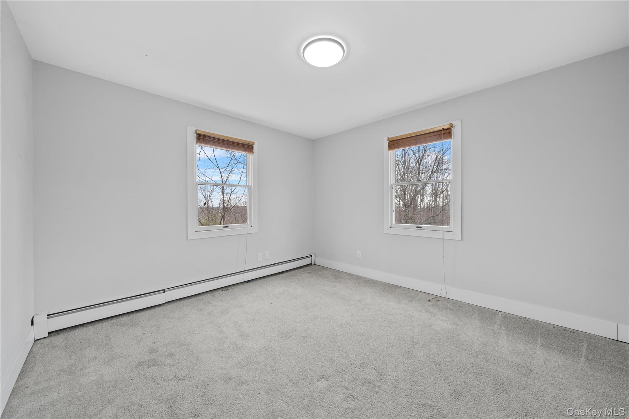 57 School Road Monroe, NY 10950 - Photo 26 of 33 an empty room with a window