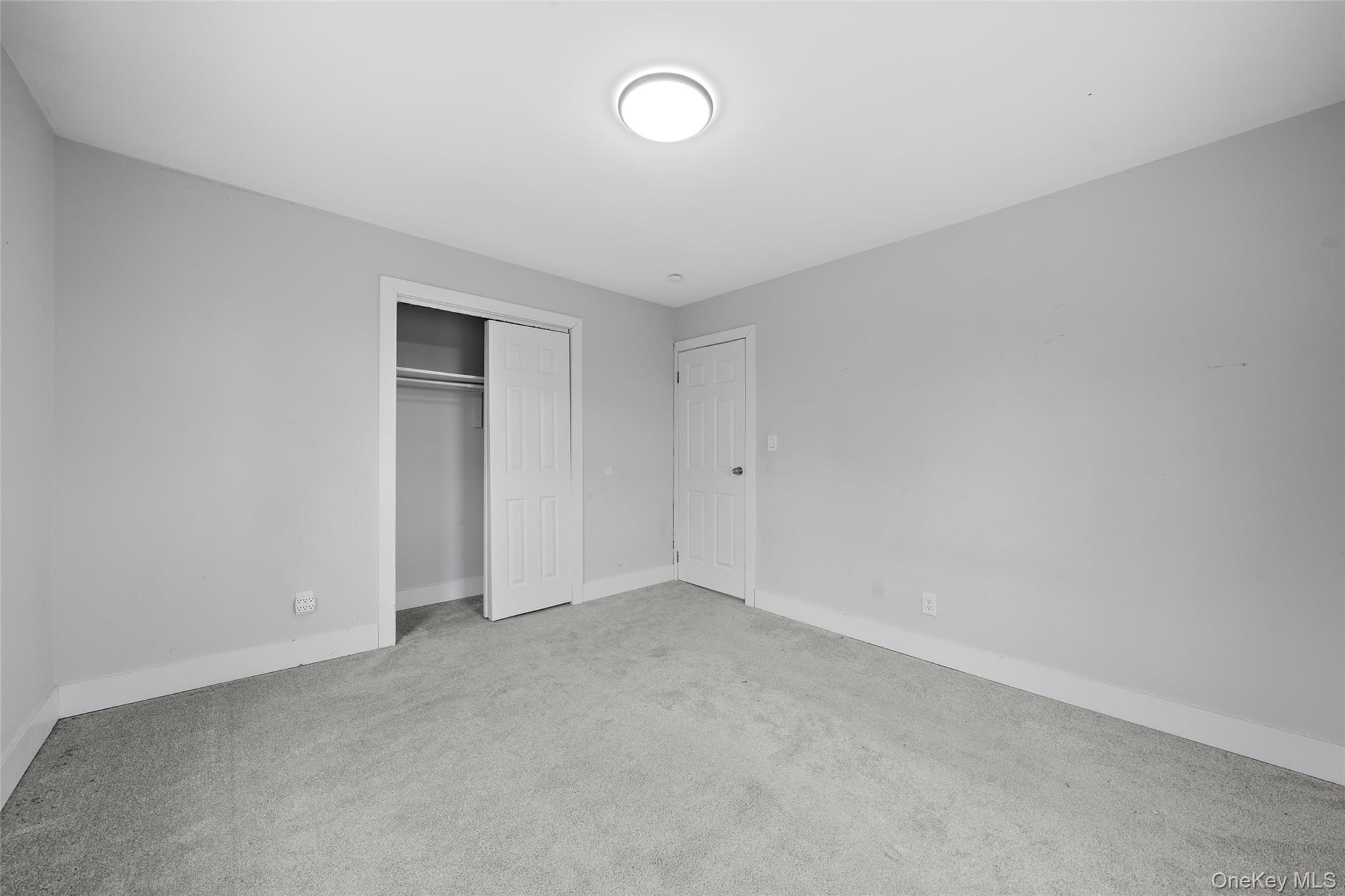 57 School Road Monroe, NY 10950 - Photo 27 of 33 wooden floor in an empty room