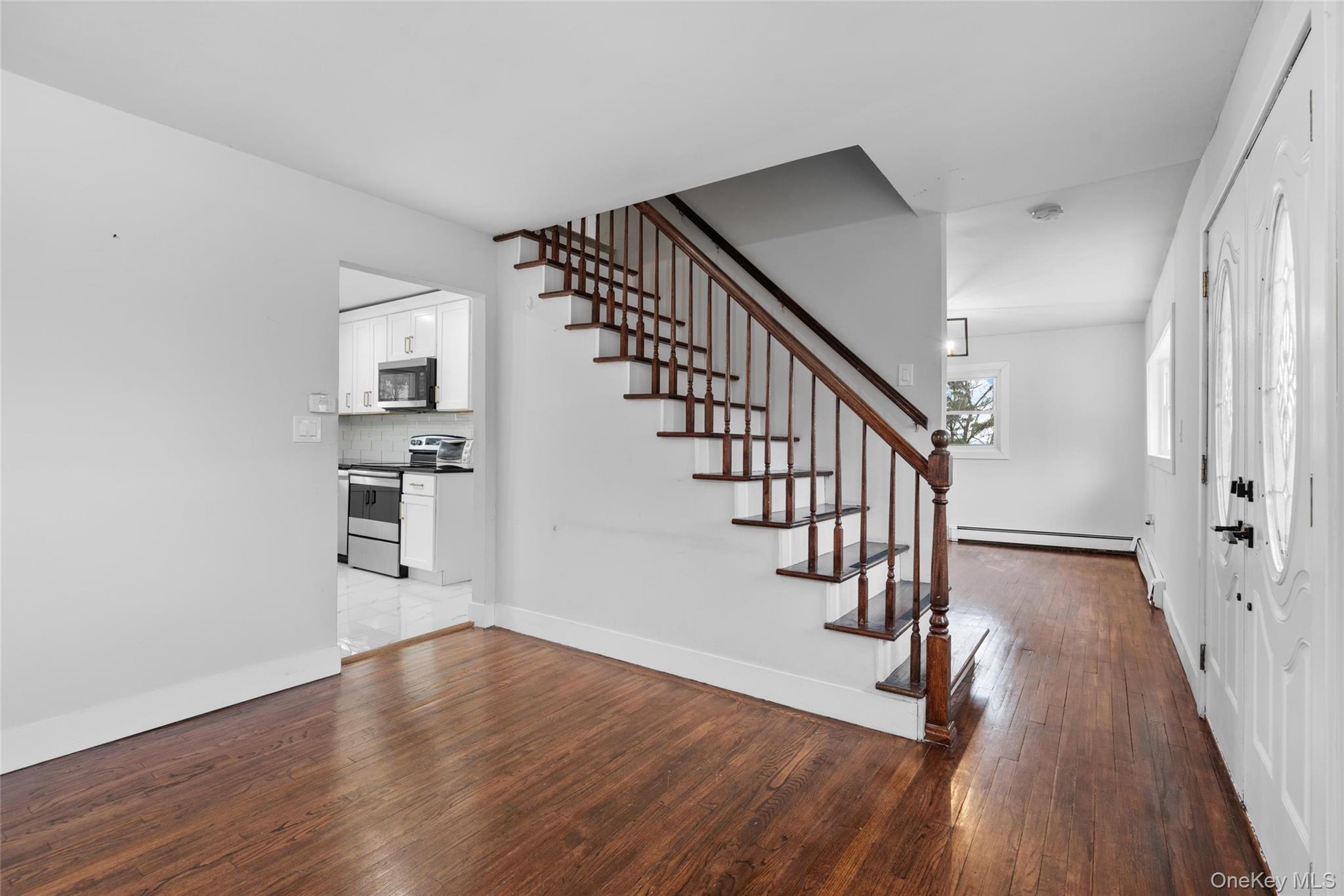 57 School Road Monroe, NY 10950 - Photo 7 of 33 a view of entryway and hall with wooden floor