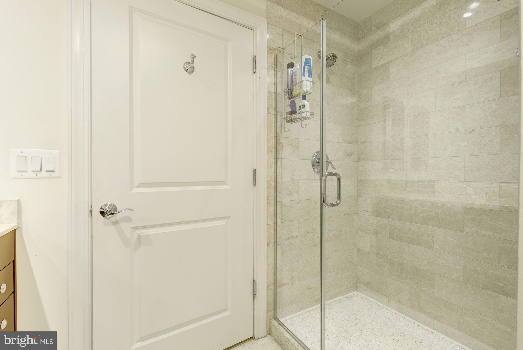 2425 L Street Northwest, Unit 539 Washington, DC 20037 - Photo 21 of 31 a bathroom with a shower